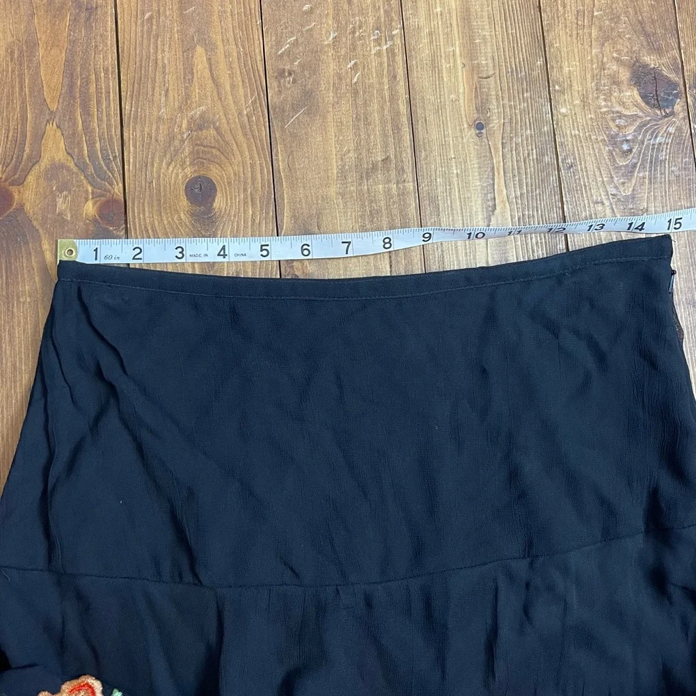 Vintage collection midi length black embroidered skirt size small